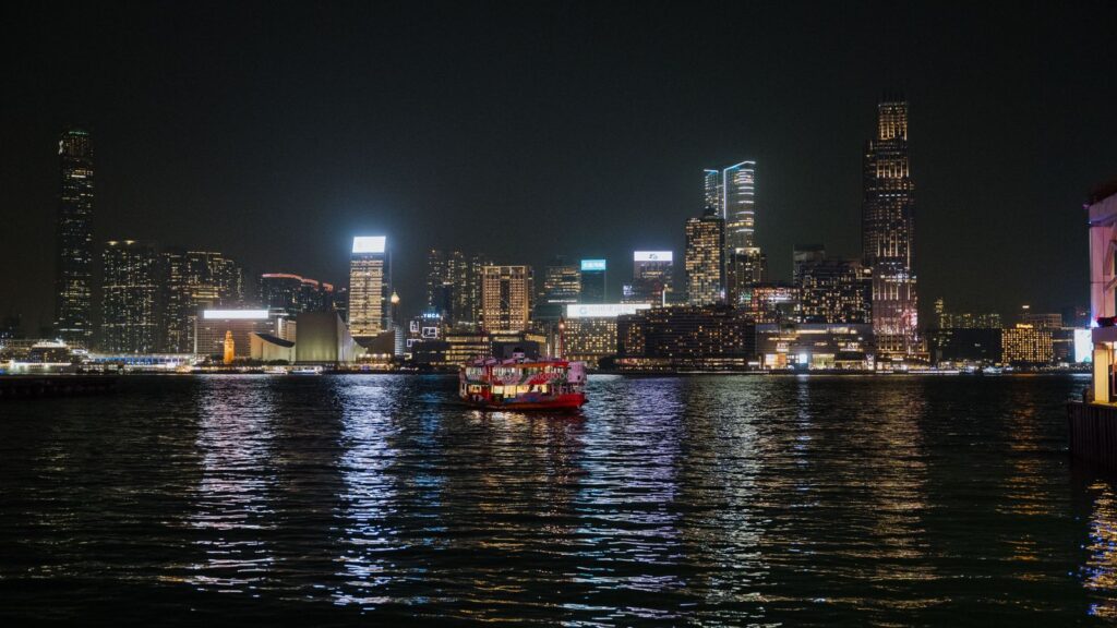 Hong Kong harbour skyline at night — TravelDeals AI