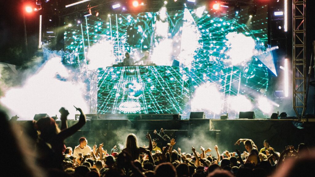 Dance music festival at night — TravelDeals AI