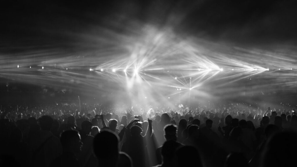 Music festival crowd and stage lights